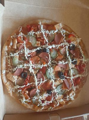 Pizza ordered as a take-out at Vitos Vegan - Витос веган in Ulaanbaatar