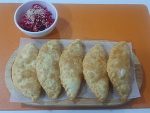 Vegan khuushuur with salad (the side dish) at Vitos Vegan - Витос веган in Ulaanbaatar