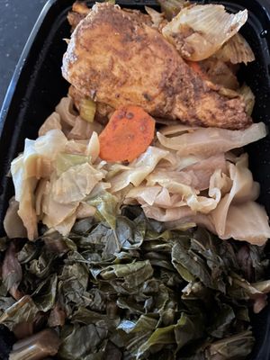 Jerk chicken, cabbage, and collard greens  at The Nile Cafe in Philadelphia