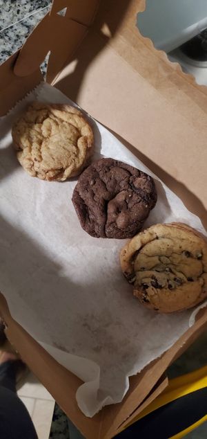 Bought a cookie box: chocolate chip, snickerdoodle, and double chocolate. Set comes 9 (three of each) at The Nile Cafe in Philadelphia