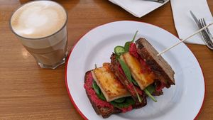 Vegan Tofu b Sandwich and Oat milk latte at Airtime Cafe in Lauterbrunnen