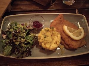 Vegan schnitzel with potato salad at Paletti Die Genuss Bar in Neu-isenburg