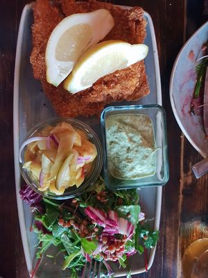 Schnitzel with green sauce at Paletti Die Genuss Bar in Neu-isenburg