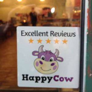 Happy Cow Sticker on display  at The Bohemian in Newcastle Upon Tyne