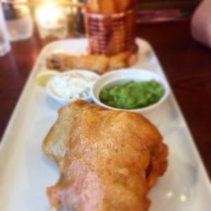 Fish and chips with spicy battered sausage at The Bohemian in Newcastle Upon Tyne