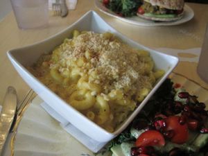 This is the vegan mac n cheese and it is really good. It doesn't taste like commercial vegan cheese; it may be nutritional yeast or cashew-based. It was served really hot too, which I appreciated. at Le Doggy Cafe in Montreal
