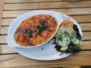 Kräuterpolenta mit Kürbis-Käsecreme at Gruene Kombuese in Rostock