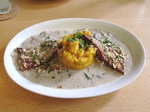 Mushrooms with mashed sweet potatoes and tofu.  at Gruene Kombuese in Rostock