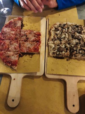 Truffle pizza and amatricana pizza at Buddy VEGGY in Rome