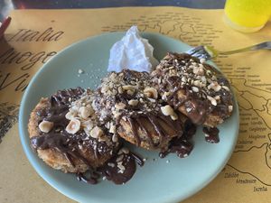 Vegan pancakes with chocolate hazelnut spread and cream  at Buddy VEGGY in Rome