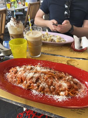 Pasta Amatriciana (tomato based) and carbonara (opposite) with iced coffees   at Buddy VEGGY in Rome