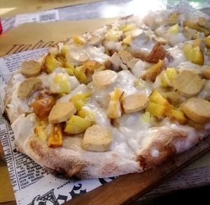 Wurstel Pizza (sausage and potato) at Buddy VEGGY in Rome