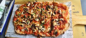 Mushroom pizza with marinara,  we chose to leave off the vegan cheese. at Buddy VEGGY in Rome