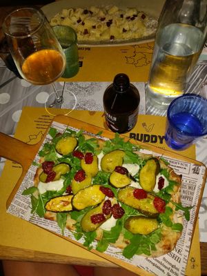 Pinsa Primavera and carbonara in the back at Buddy VEGGY in Rome