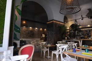 Seat beside the window looking out onto the street  at Buddy VEGGY in Rome