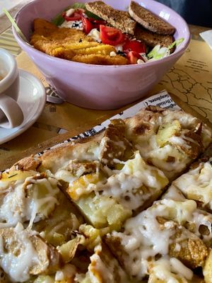 Caesar salad and pizza Wurstel  at Buddy VEGGY in Rome