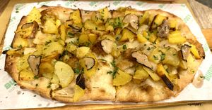 Pinsa with Potatoes and Truffles   at Buddy VEGGY in Rome