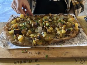 pinsa with potatoes and black truffles  at Buddy VEGGY in Rome