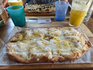 Pinsa quattro formaggi 14€ at Buddy VEGGY in Rome