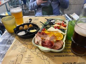Vegan cheese/charcuterie and fried olives at Buddy VEGGY in Rome
