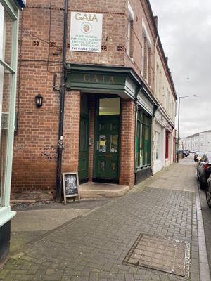 entrance to garden shed cafe through this alley :) at The Garden Shed Cafe in Leamington Spa
