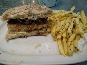 Seitan burger with fries at Hamburgueria do Bairro - Abarracamento in Lisbon