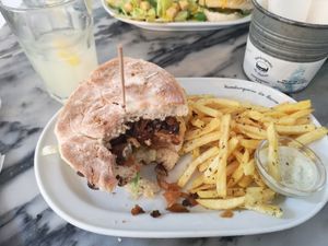 Tempeh-burger. Much nicer than on this picture. Couldn't resist eating before the capture. at Hamburgueria do Bairro - Abarracamento in Lisbon