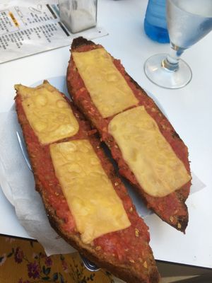 Toast with vegan cheese and tomato. Breakfast  at El Candil in Almeria