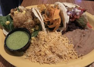 Taco Plato: sadly every single item on this plate was hella bland and unseasoned   at Tex Tubb's Taco Palace in Madison