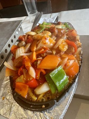 Tipan mix with chicken, sausage and squid  at De Oude Plek in Rotterdam