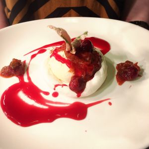 vegan Pavlova with rhubarb and cherry compote  at Momo Restaurant in Waterford