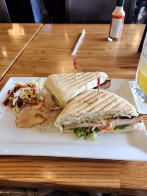 Tofu banh mi, OJ, and coleslaw (too vinegary for me) at Pika's Cafe in Guam