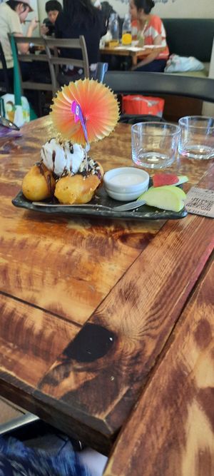 Fried bananas with ice cream and soy cream at Golden Lotus Vegan in Newtown