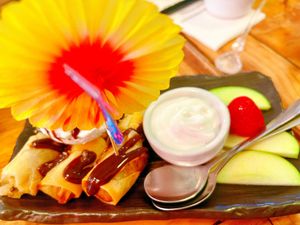 Banana Rolls with Coconut Cream and Ice Creamm  at Golden Lotus Vegan in Newtown