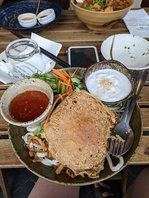 Thick noodles with coconut cream at Golden Lotus Vegan in Newtown