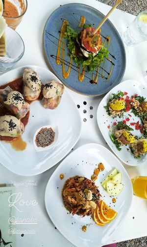 -Rice rolls stuffed with different vegetables and topped with humus
-vegan burger
-"curry" - like dish topped with cashews  at Art of Raw at The Garden Lounge in Zadar