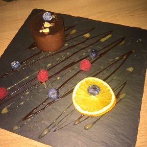 Dark chocolate & hazelnut mousse with berries  at Art of Raw at The Garden Lounge in Zadar