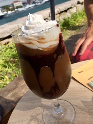 Cold brewed coffee/mocha frappucino with plant based whipped cream  at Art of Raw at The Garden Lounge in Zadar