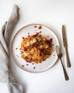  Sweet potato pasta with vegan minced meat, zucchini, sundried tomato-paprika sauce and vegan cheese at SEM Sla En Meer in Amersfoort