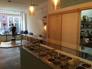 Salad bar and cosy seating near the window at SEM Sla En Meer in Amersfoort