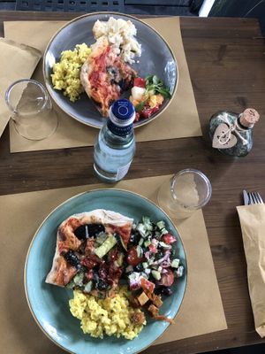 Buffer menu - pizza, risotto, cauliflower, greek salad. Everything delicious!  at Bio Essere in Arco