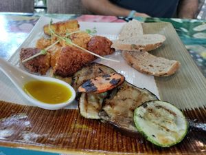 Falafel and hummus plate. Teeny portion of bread for the hummus. at Green Room Cafe in Jaco