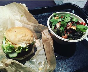 Burger and side dish at Superiority Burger in New York City