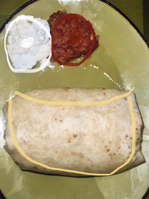 One happy thicc (vegan) burrito  at Mad Mex in Erie