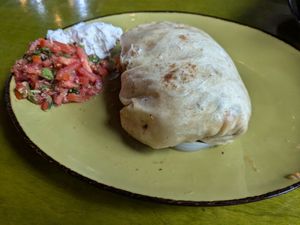 Burrito with pico de gallo and vegan sour cream at Mad Mex in Erie