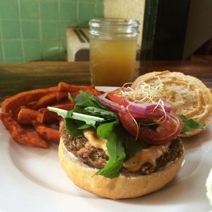 Quinoaburguer, served with vegan cheddar and sweet potato fries at FOREVER in Mexico City