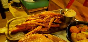 Batatas con crema de cacahuete y coco at Recyclo Bike Cafe in Malaga