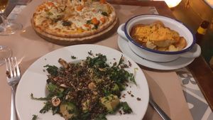 Vegetable pizza, supergreen salad and patatas bravas at Vegetalia - Born in Barcelona
