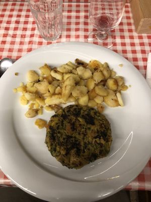 Vegan Burger with potatoes. at Rifugio Vajolet in Vigo Di Fassa