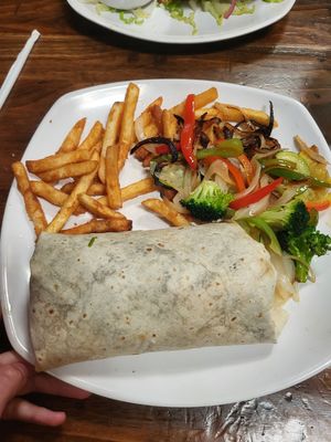 burrito with 2 sides at Camino Real Kitchen and Tequila in Bakersfield